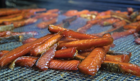 peppered maple glazed candied smoked salmon on a rack