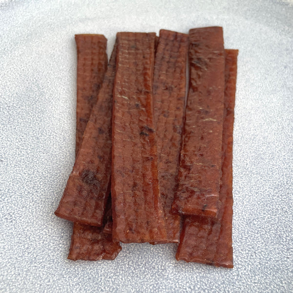 cheena smoked salmon jerky 75g on a plate